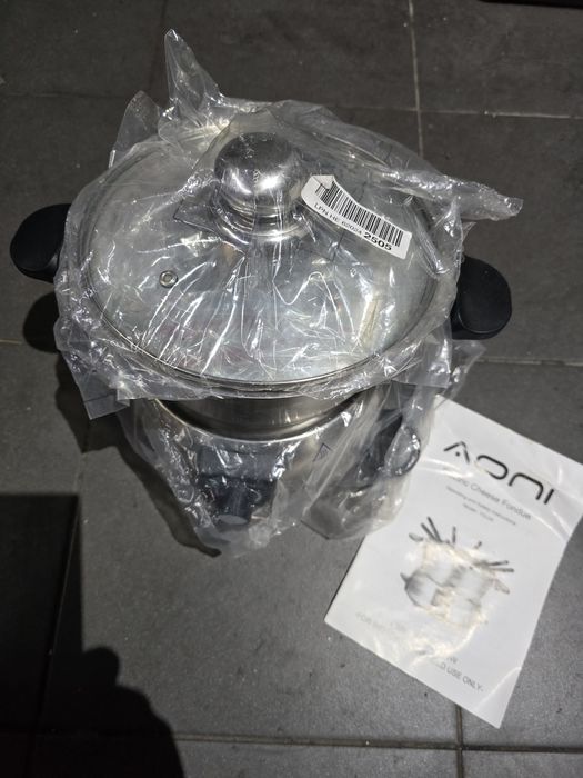 Piecyk elektryczny AOMI z garnuszkiem NOWY.