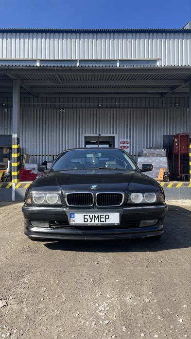 Бмв е38 728і.