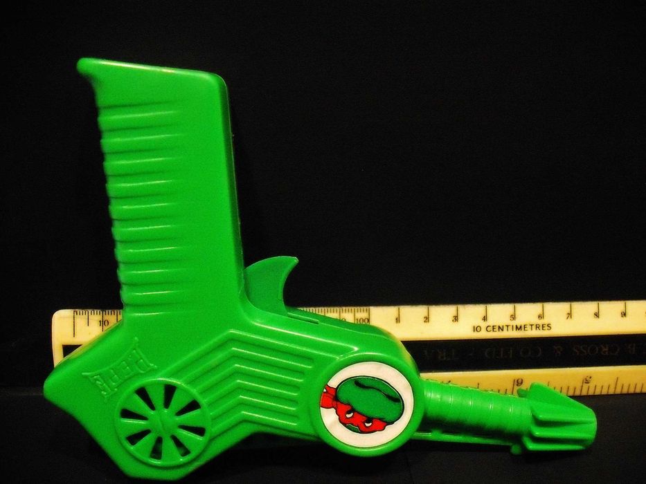 Pistola com dardos da tartaruga Ninja PEPE antiga