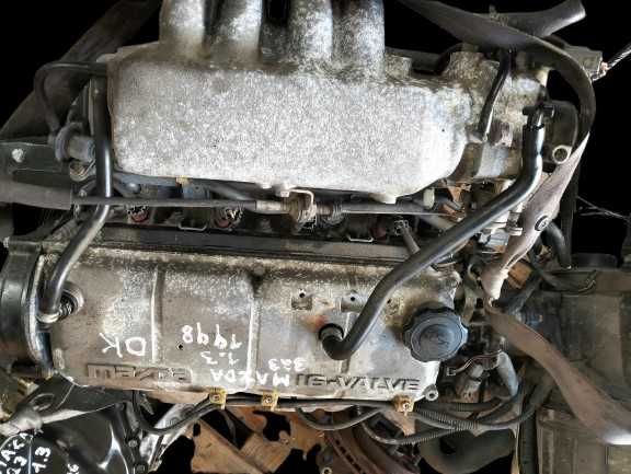 Farol de Mazda 323 de 1998 1.3i