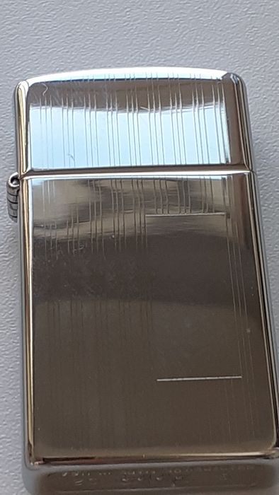 Isqueiro NOVO Zippo Slim alto brilho