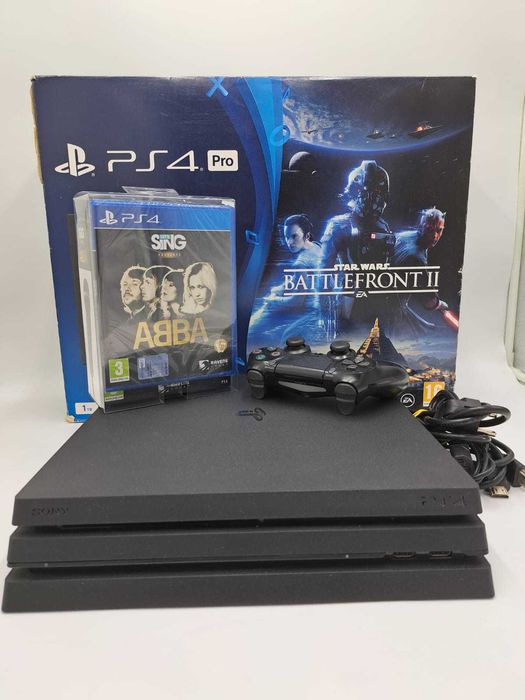 Zestaw Konsola Ps4 Pro 1000+ Let's Sing Abba (Zestaw z mikrofonami)