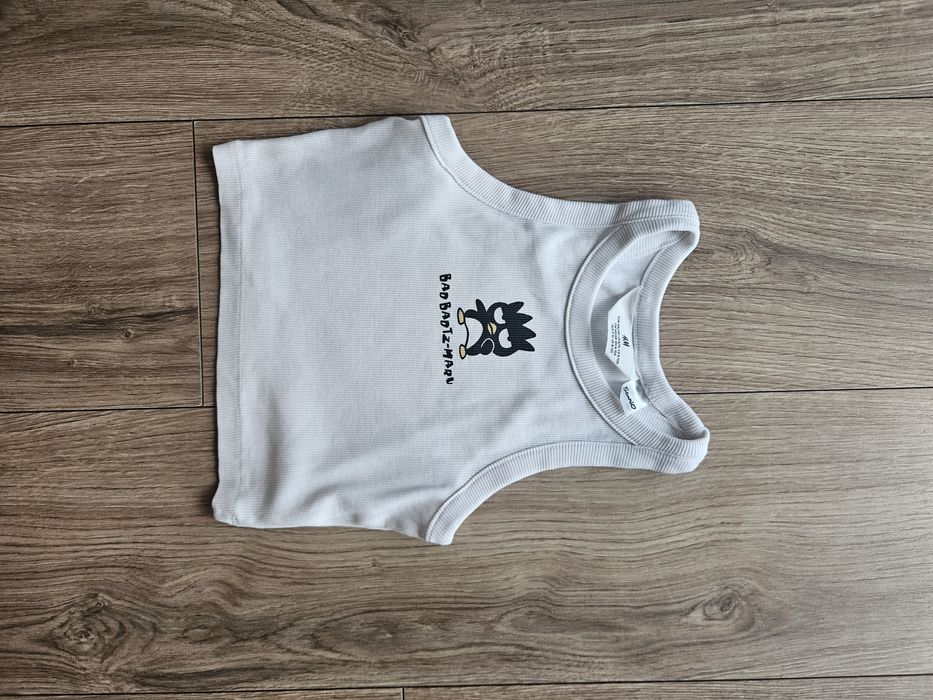 Biały crop top H&M 134/140
Dł całk ok.38cm, szer pod pachami ok