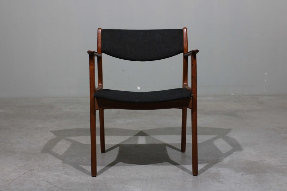 Par cadeirões Henning Kjaernulf em teca | Danish Design