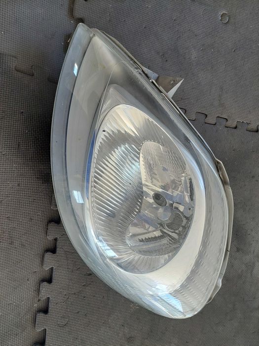 farol esq. Renault trafic