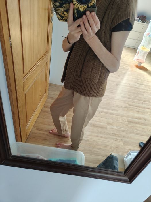 Kamizelka Zara z misiem w kapturze.