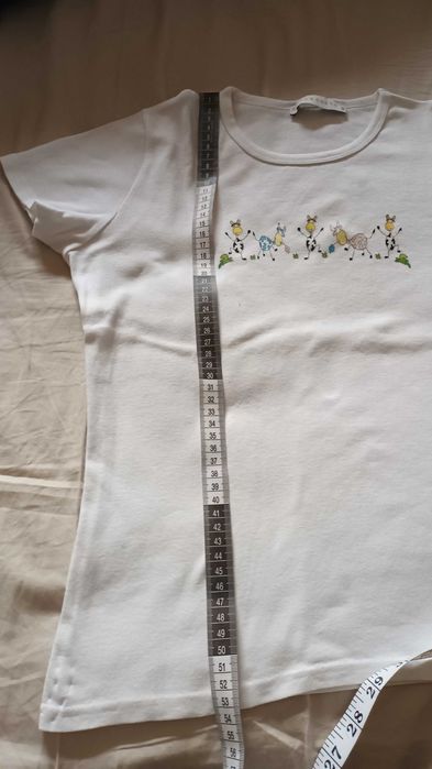 T-shirt branca da cache cache