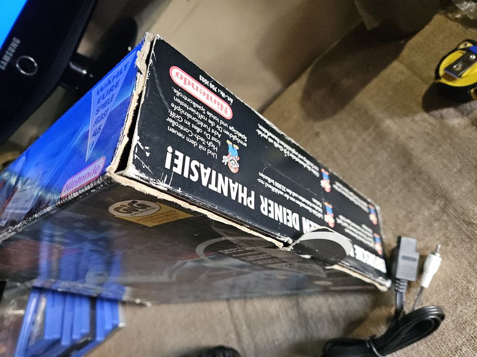 Super Nintendo com caixa