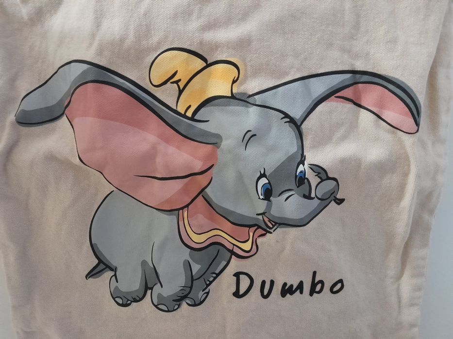 Saco de lona bege com o Dumbo, o icónico elefante voador da Disney