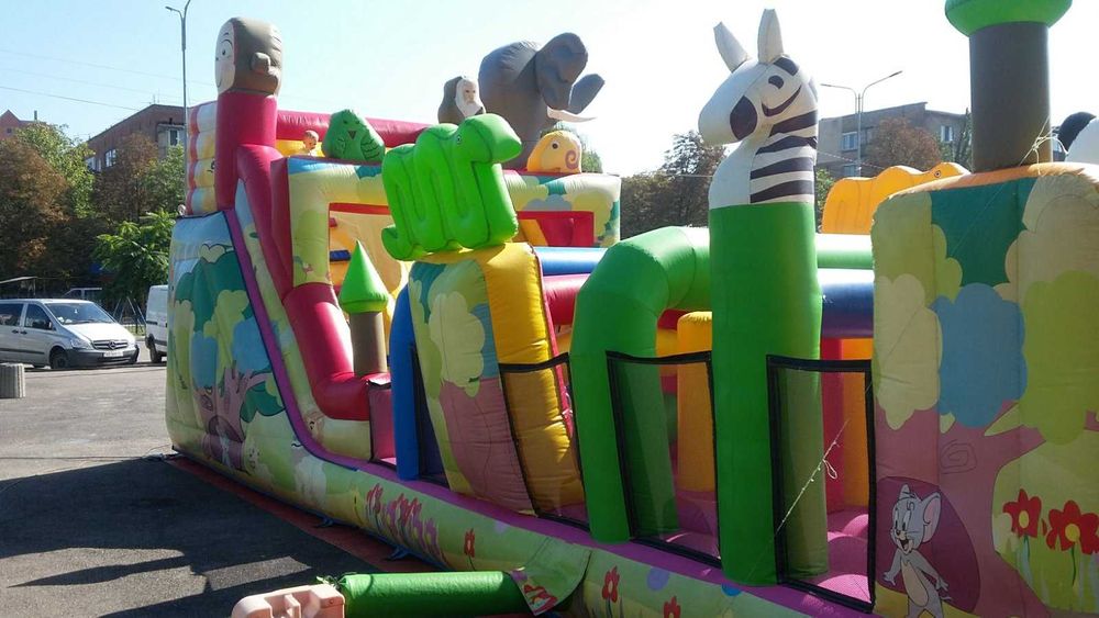 Надувний батут з гіркою "Зоопарк".