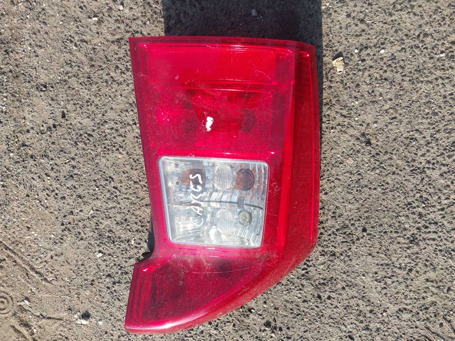 Lampa lewa tyl tylna kia carens 3