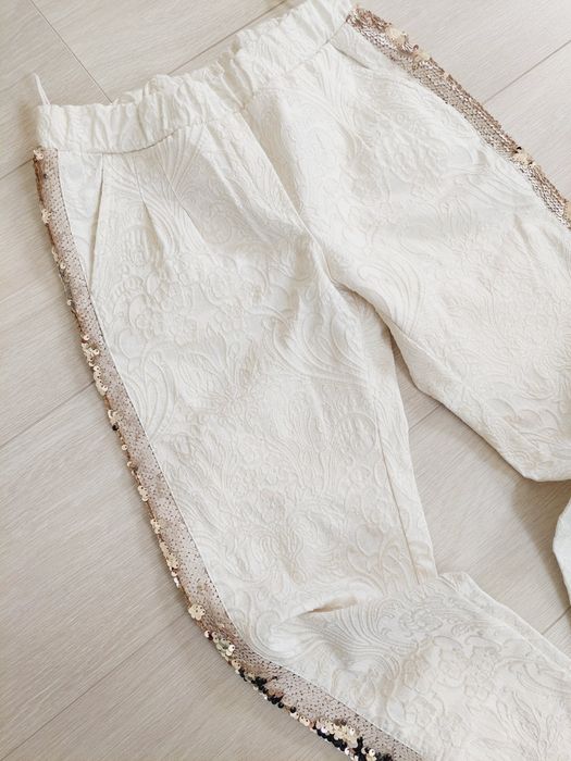 Eleganckie spodnie kremowe rizm 34-36 XS-S