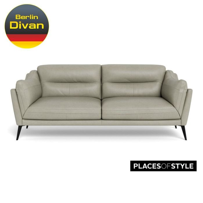 Новий   тримісний диван з натуральної шкіри .  Німеччина .