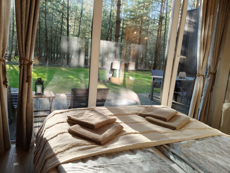 Domki na wynajem w lesie pod Warszawą - jacuzzi i sauna