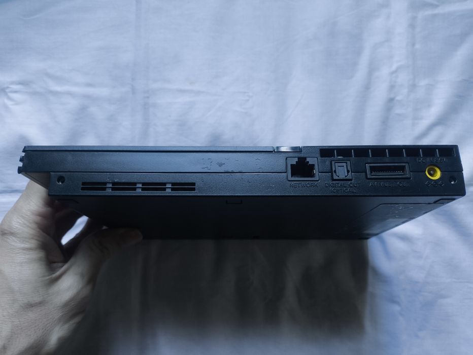 PlayStation 2 Slim + Extras
