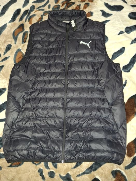 Чоловічий пуховий жилет