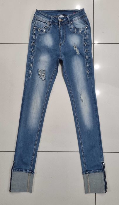 Spodnie damskie jeans z dziurami rozmiar XS