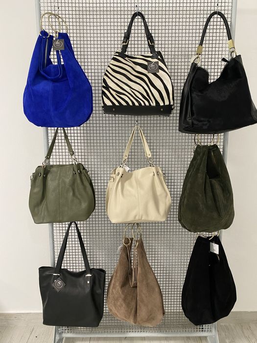 Lote de 350 peças roupa e malas para senhora