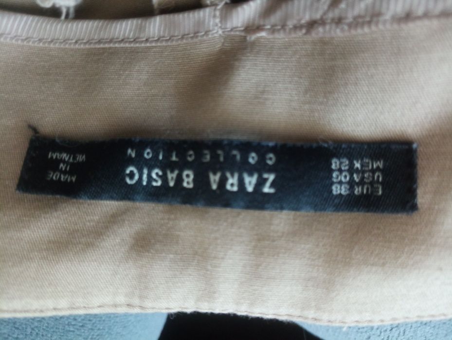 Beżowe spodnie biurowe 38