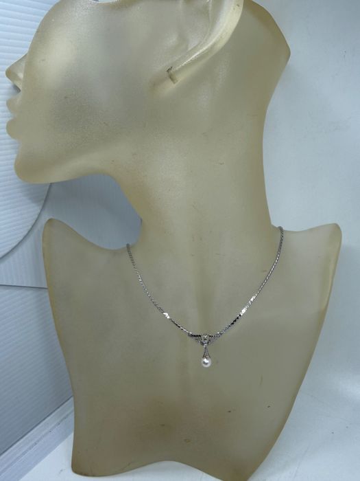 Naszyjnik z perłą i brylantami białe złoto próba 585 Certyfikat