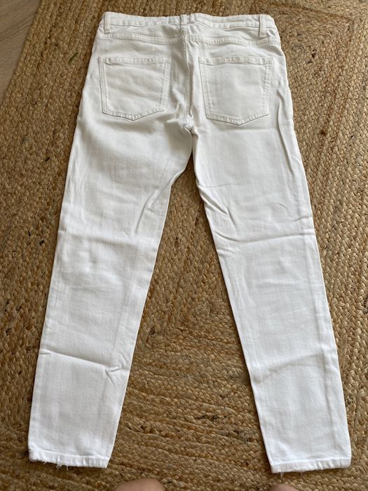 Białe spodnie jeansy Zara 36