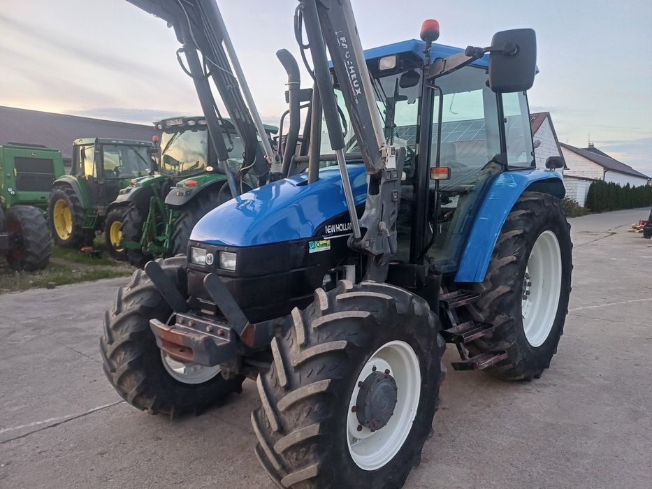 New Holland TS100 Sprowadzony ładowacz case CS100 valtra6250 mf6140 ...