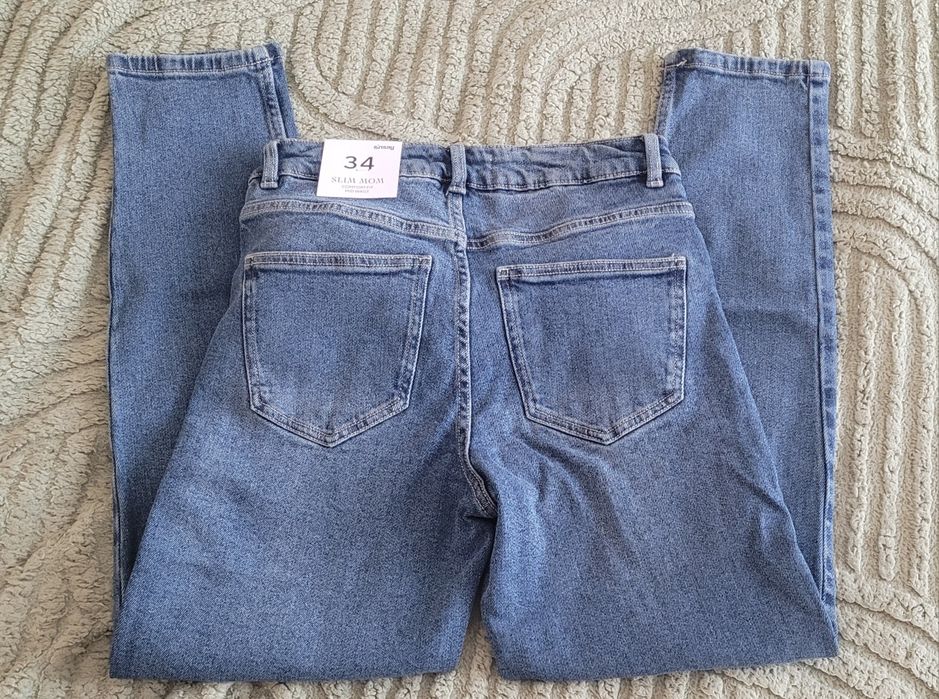 Jeansy mom slim r.34. Sinsay
