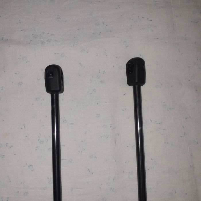 Амортизатори капота, перед і зад на пассат б7.