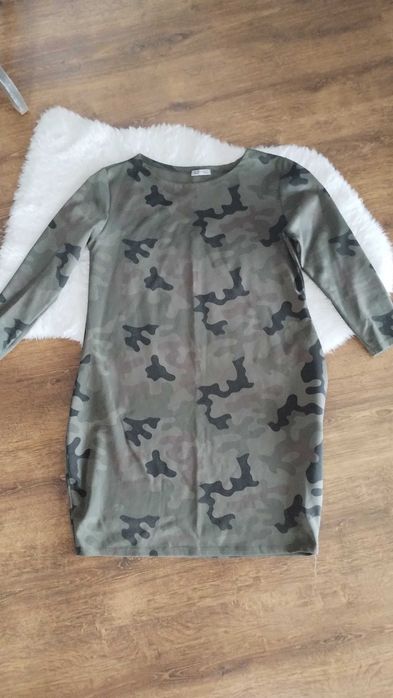 Włoska sukienka z kieszeniami rozm.M/L