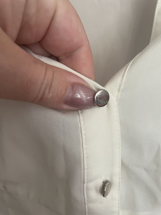 Блуза молочного кольору