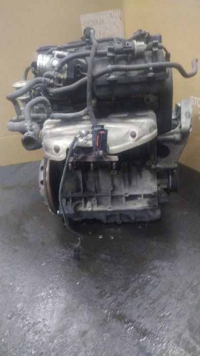 / Passat B6 Golf V Octavia II silnik kompletny 1.6 8V BSE