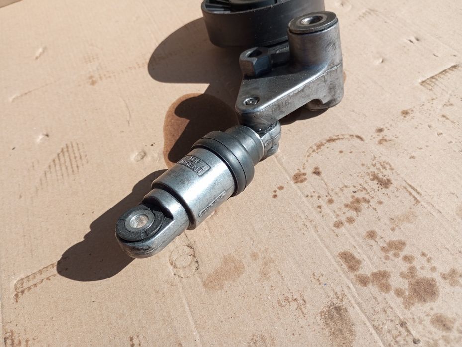 Натяжний ролик механізм 2.0 2.2 Opel Vectra Zafira Astra Omega Fronter