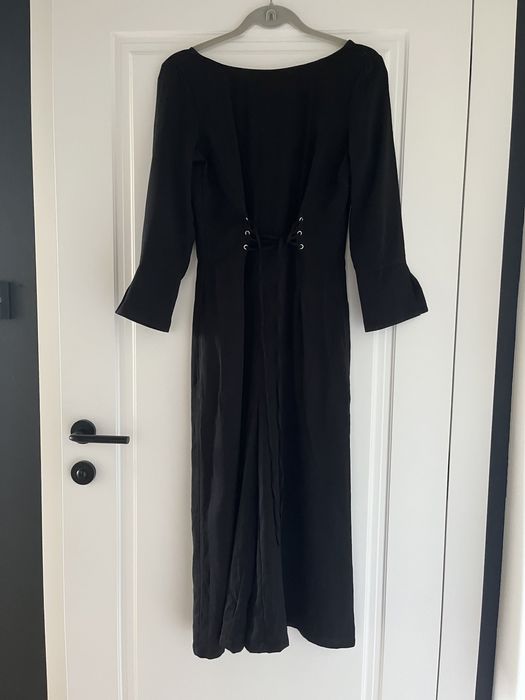 Czarny kombinezon reserved