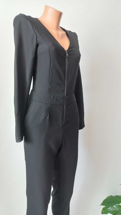 Чорний комбінезон  44 розмір новий