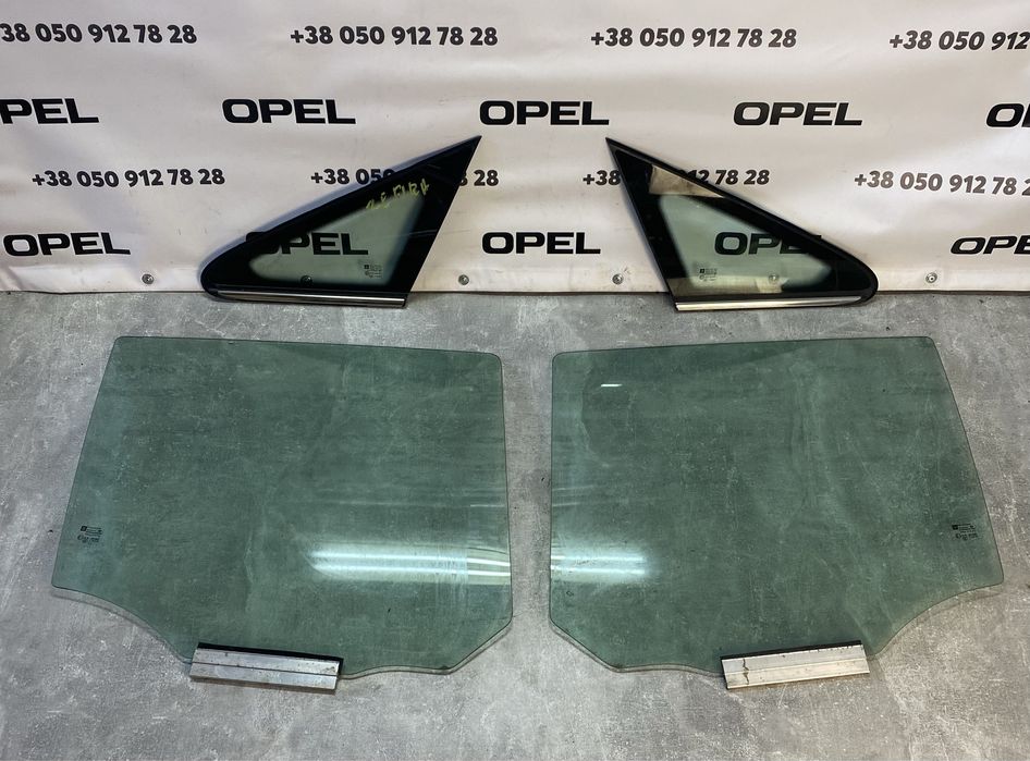 Стекло двери передня задня Opel Zafira B Astra H стікло дверкі