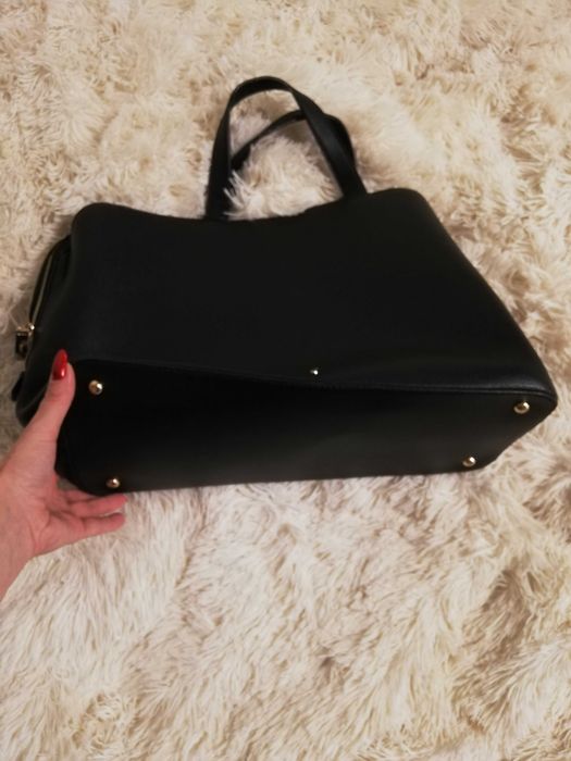 torebka skórzana Ochnik Daily liczne kieszonki zamki