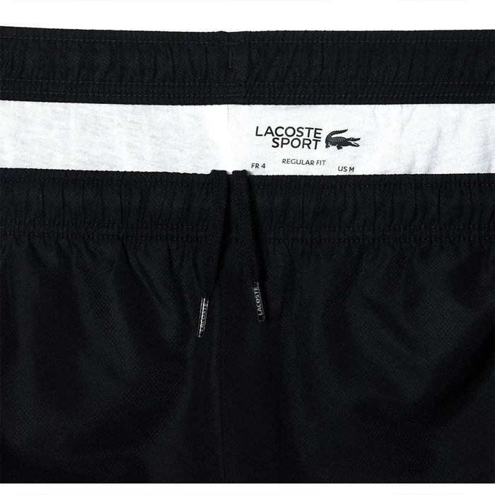 Spodnie dresowe ortalionowe Lacoste L