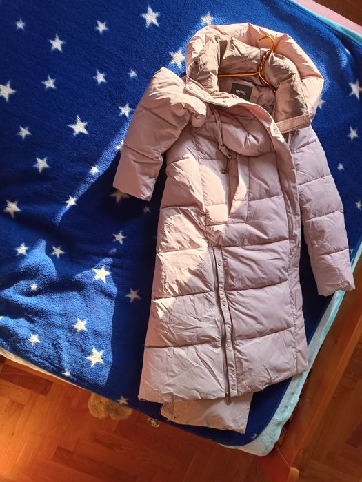 Продам пуховик женский новый
