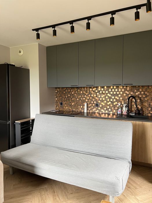 Sofa rozkładana IKEA NYHAMN, z materacem