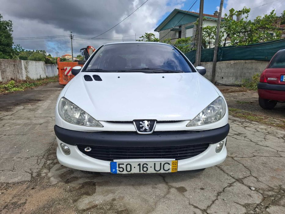 Peugeot 206 Gasolina Com A/C Estofos em Pele