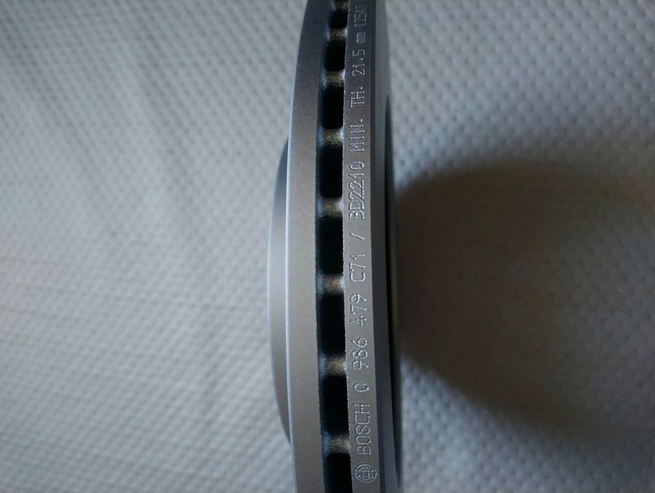 Гальмівний (тормозний) диск Bosch 0986479C71 E1-90R-02C0074/1566  новий в упаковці