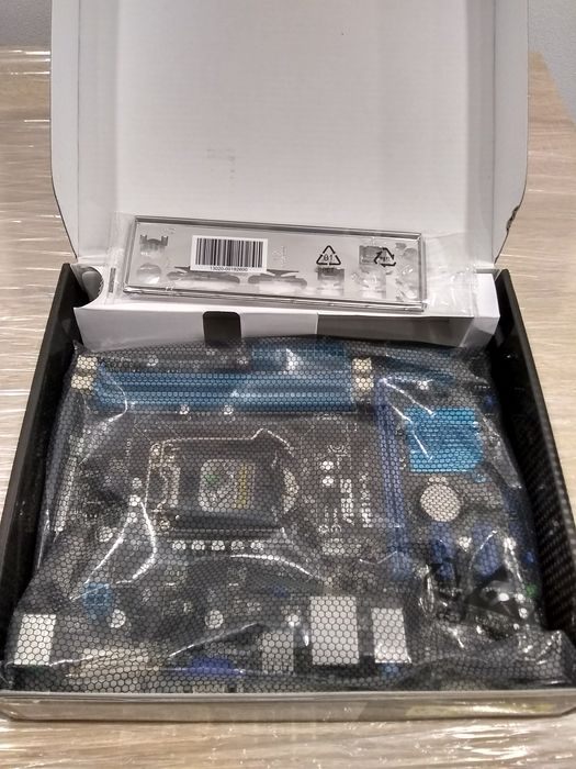 Материнська плата Asus s1155