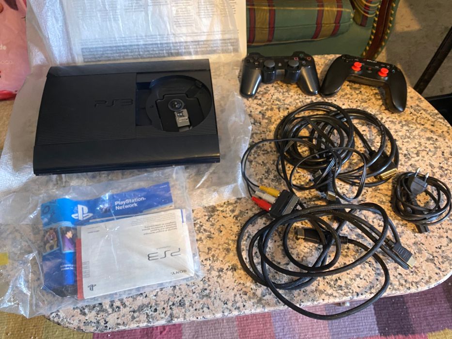 Ps3 500gb/ comandos e 13 jogos