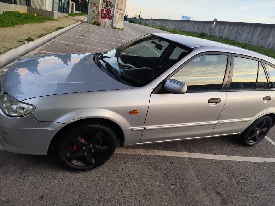 Mazda 323f 1.3 gasolina 2003