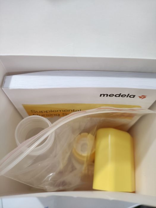 Medela - Sistema de nutrição suplementar