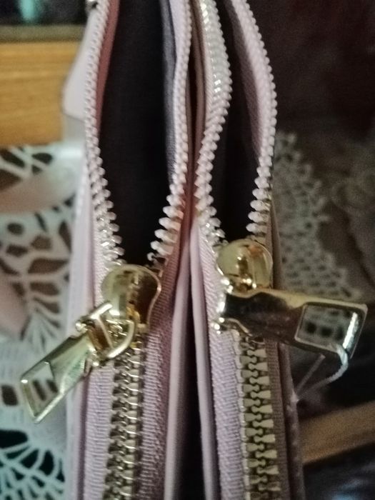 Listonoszka pudrowy roż