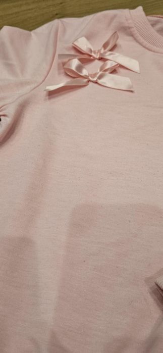 Dres dziewczęcy, różowy. Roz. 122-128.