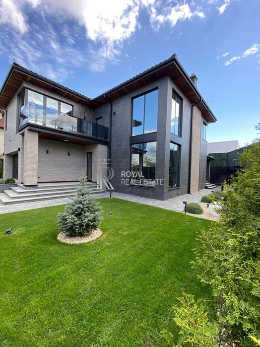 Продаж Будинок Київ Голосіївський район вул. Малокитаївська 300 м² 4 спальні Ділянка 5 соток Газ Гараж Підвал 20 кВт Під чистове оздоблення