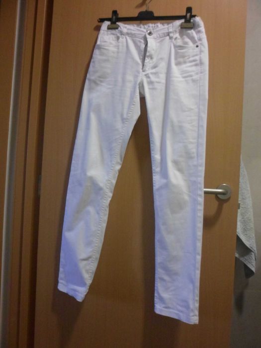 calças brancas para rapaz da marca Kids