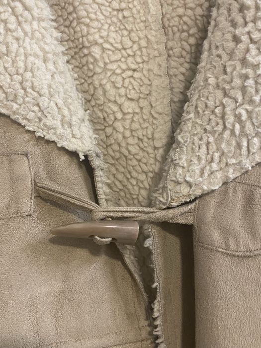 Casaco em eco pele e pelo interior